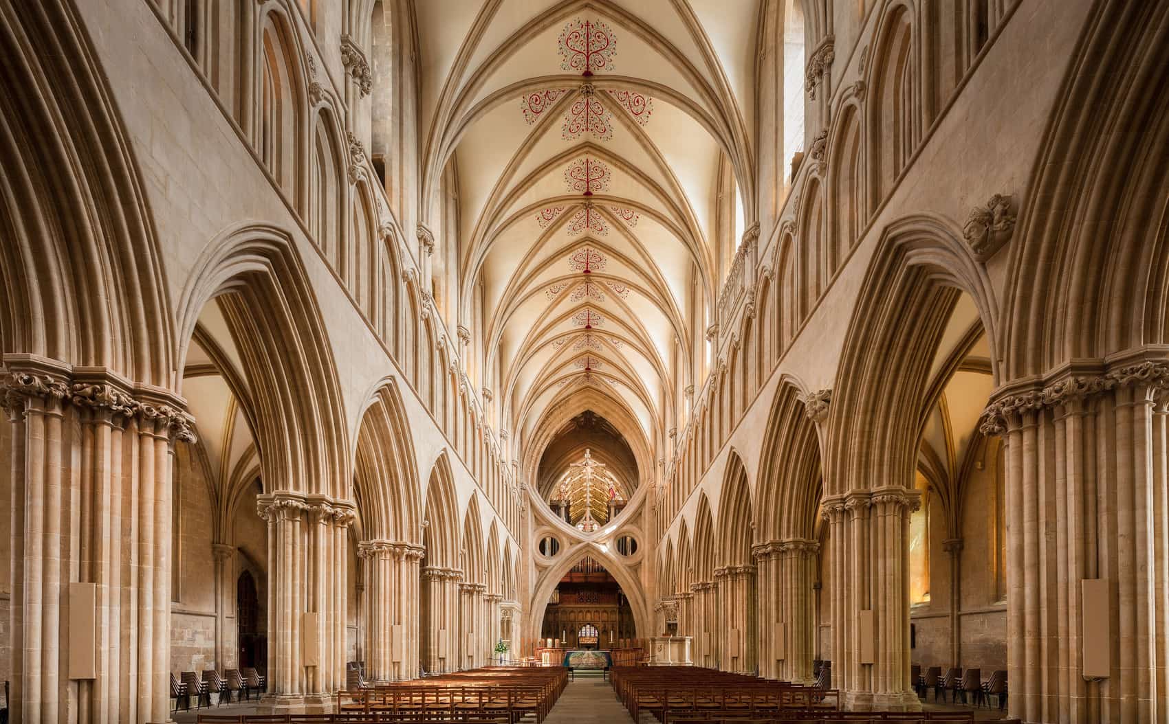 The nave looking east toward the crossing, with the vault rising overhead.